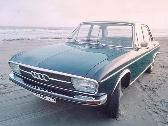 Audi 100 LS in blue front view on a beach