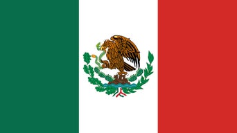 Flag of Mexico with vertical green, white, red stripes and national coat of arms in center.