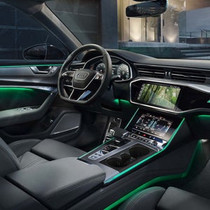 Interior of an Audi with green light theme