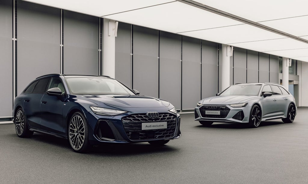 Front view of an Audi A6 Avant and an Audi RS6 Avant.
