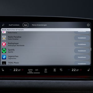 Nahaufnahme eines Displays im Fahrzeuginnenraum. Abgebildet sind diverse Apps, die zu installieren wären, unter anderem Spotify und tagesschau.
