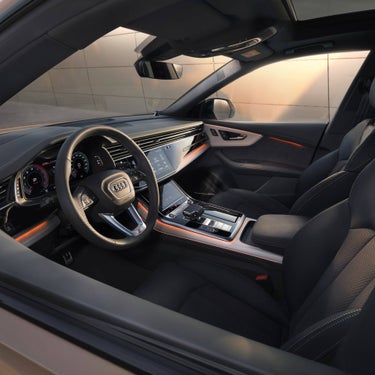 Internal view of controls and steering wheel.