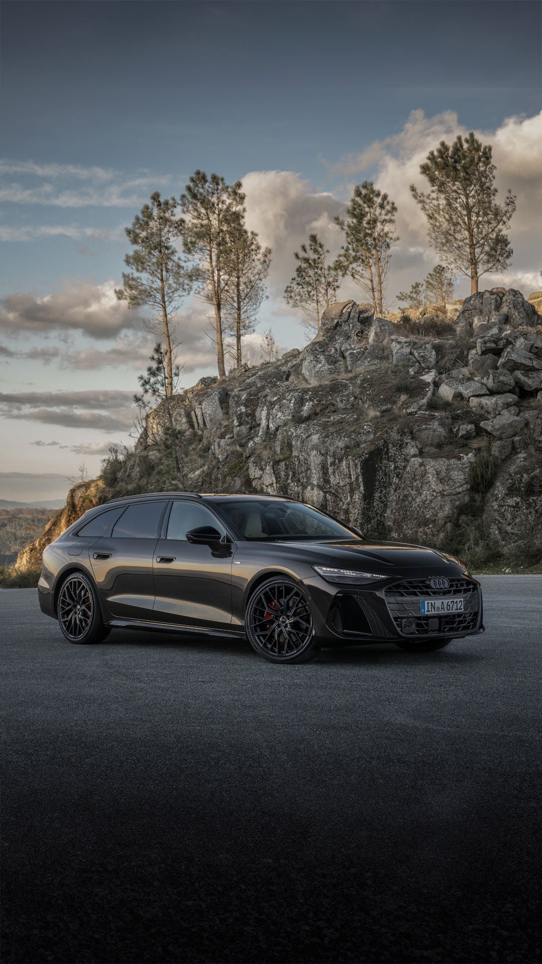 The all-new A6 Avant parked against a mountainous background