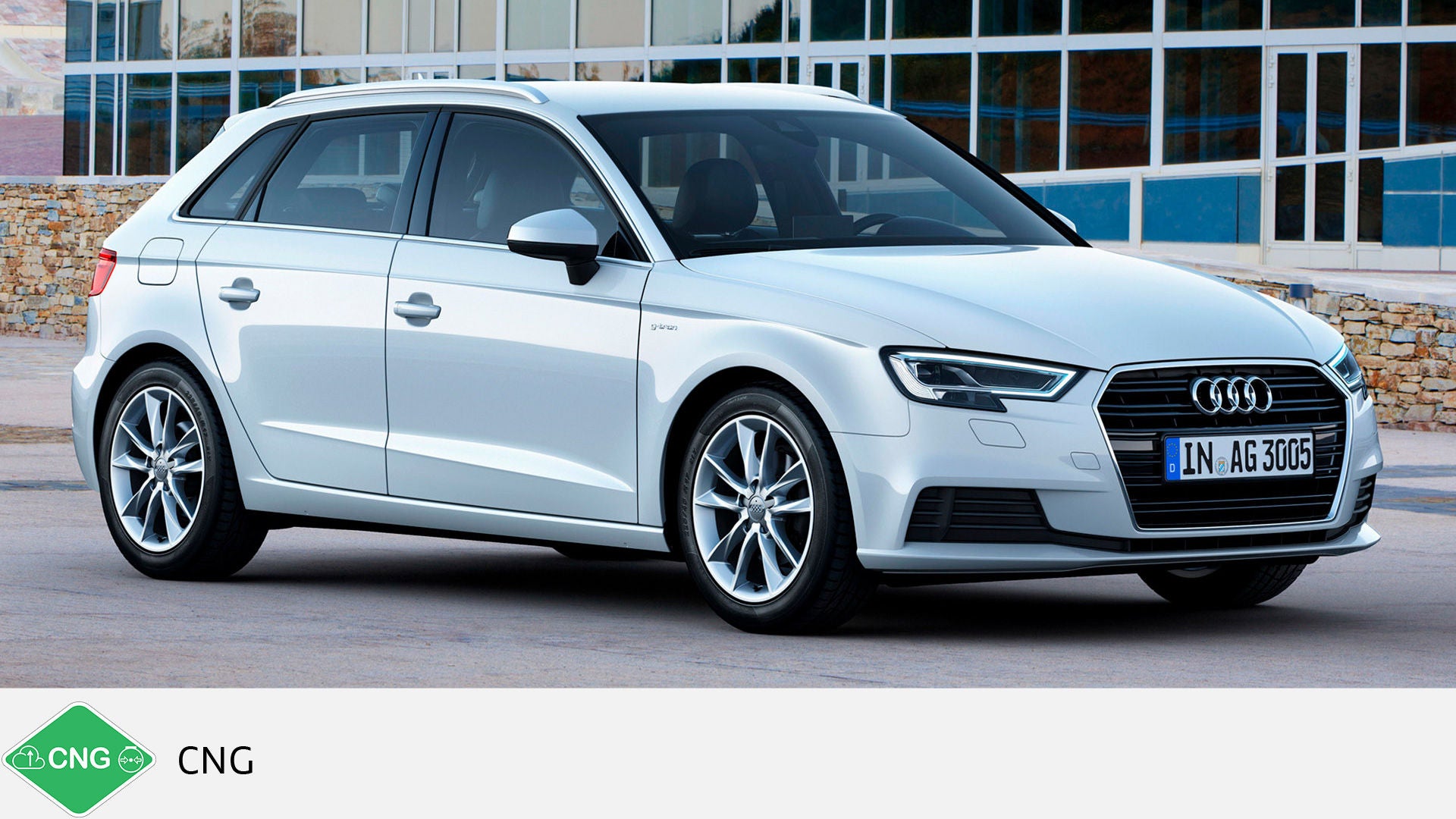 White Audi A3 Sportback g-tron standing in front of a glass facade, photographed from the side. Green CNG symbol with text at the bottom.
