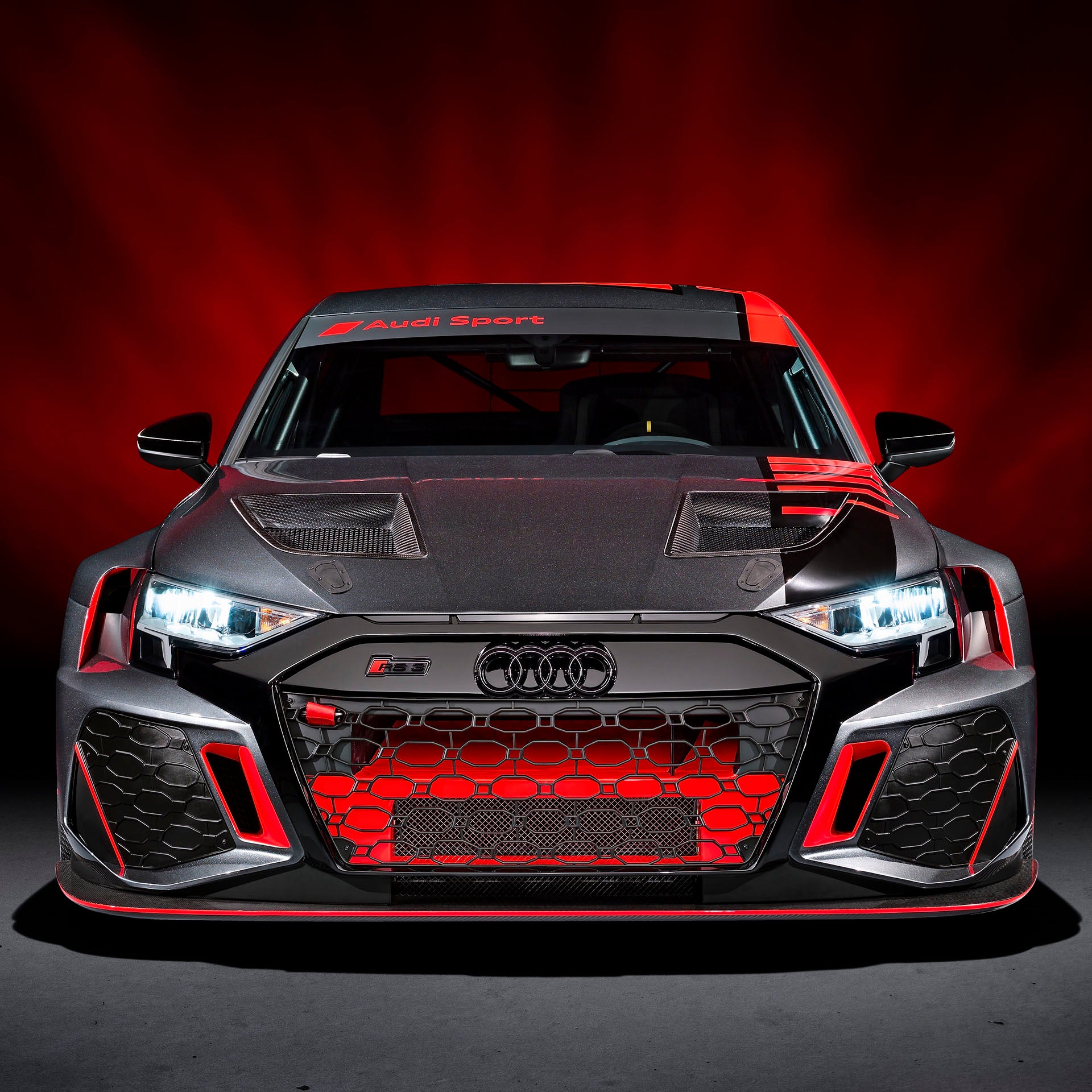 A picture showing the Audi RS 3 LMS race car on display.