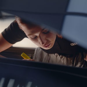 A machining looking into a car bonnet 