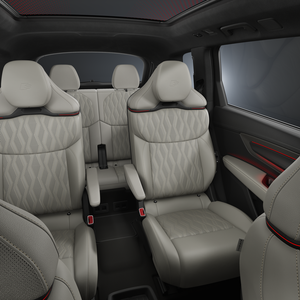 A front view of the interior, focusing on the three rows of seats.