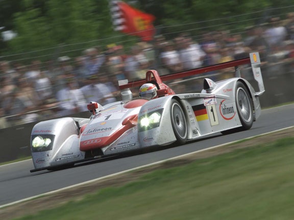 A picture showing the victorious Audi R8 on track at Le Mans in 2002.