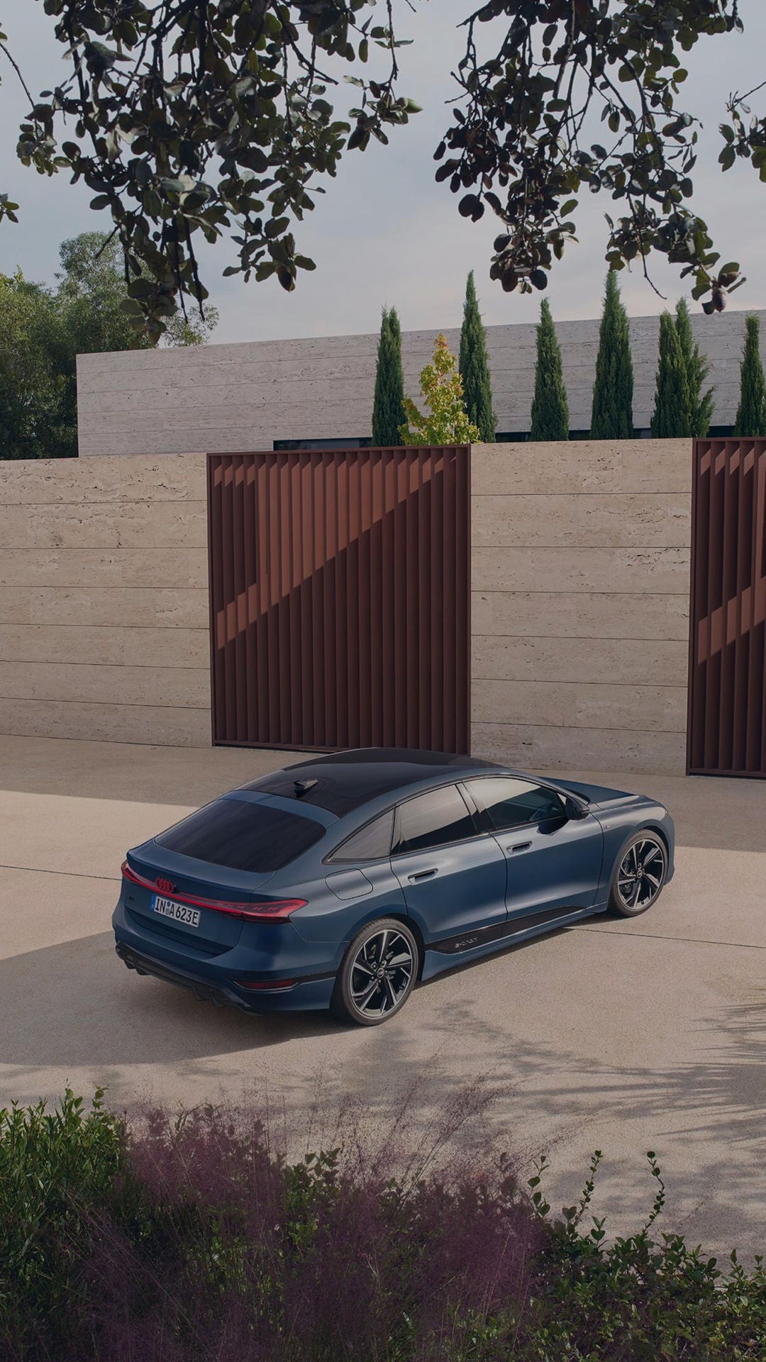 audi parked outside modern building