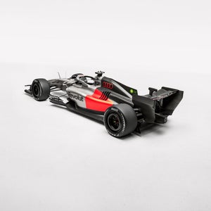 Slightly elevated view from diagonally behind the Audi R26.