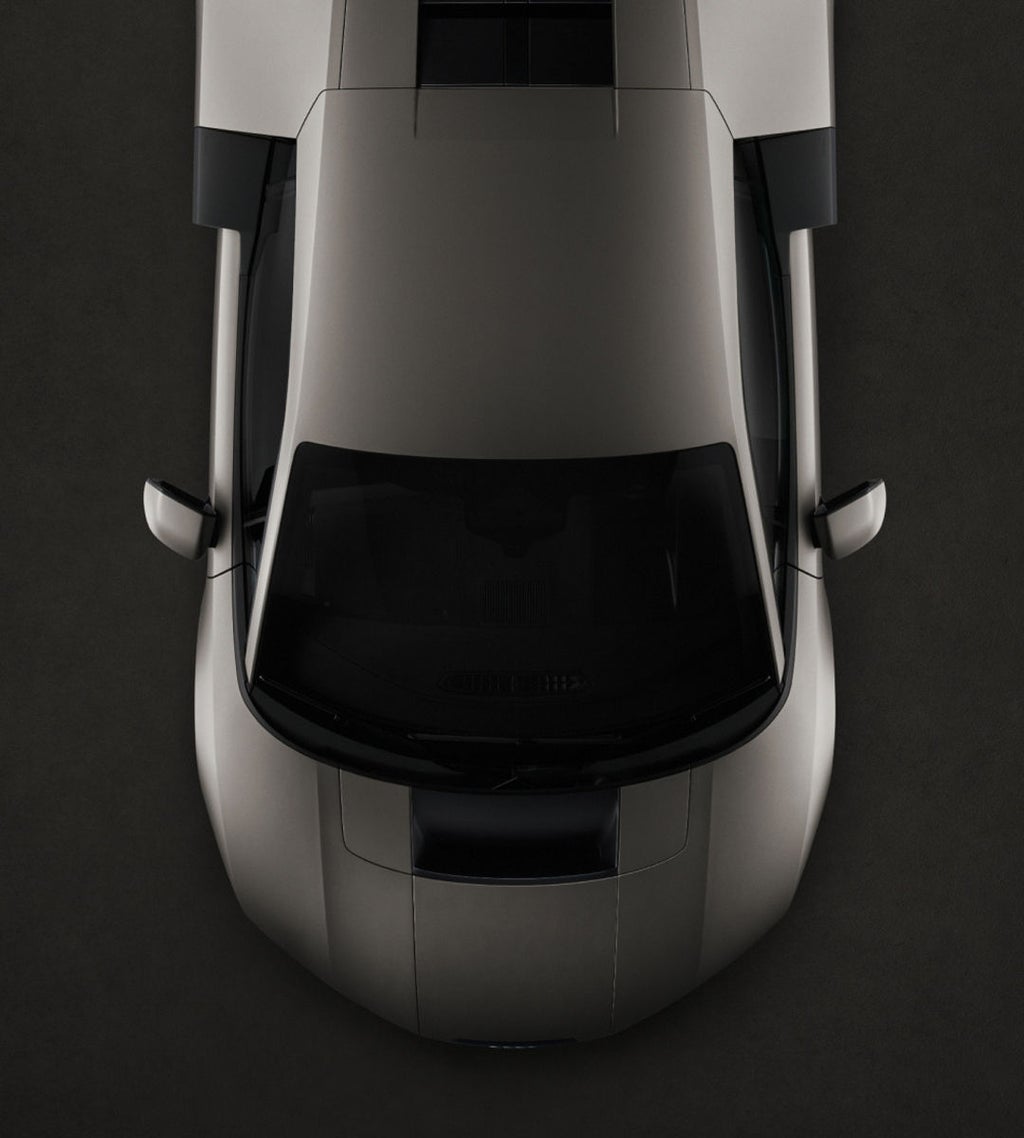 Draufsicht auf den Audi Nuvolari, die seine geformten Oberflächen und aerodynamischen Proportionen hervorhebt.