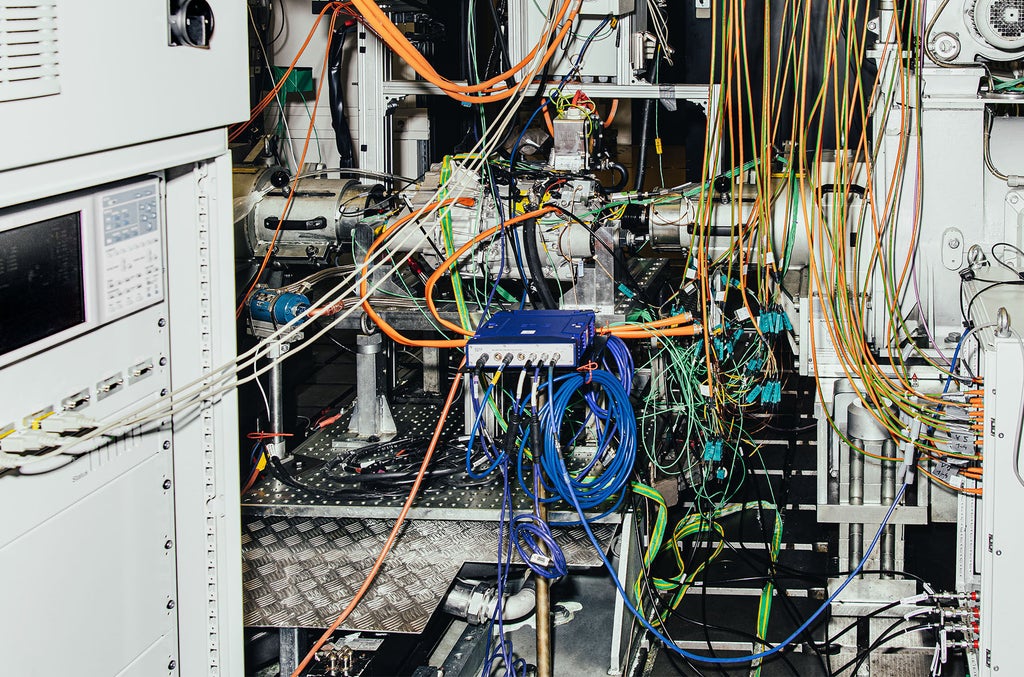 An asynchronous motor wired to a test bench.