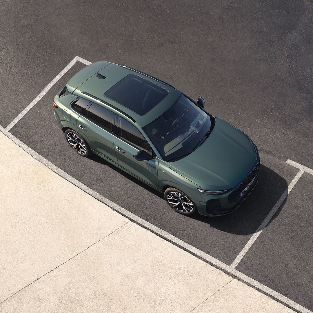 Aerial shot of a green Audi Q3 SUV