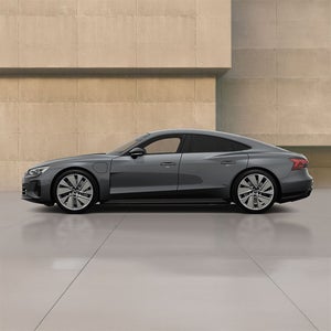 Left side of a black RS e-tron GT Audi vehicle