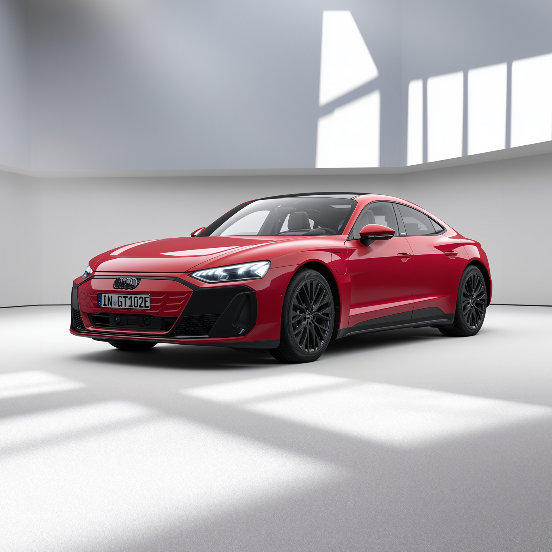 Ein roter e-tron GT quattro fährt auf einer Landstraße entlang einer Küste.