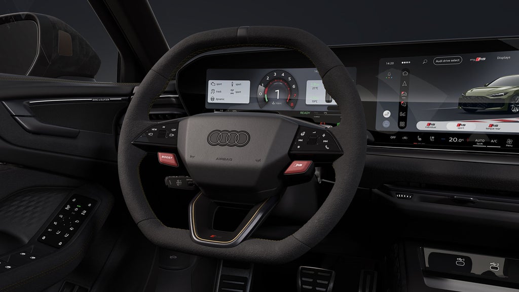 Dettaglio sul volante sportivo RS e sui display digitali.