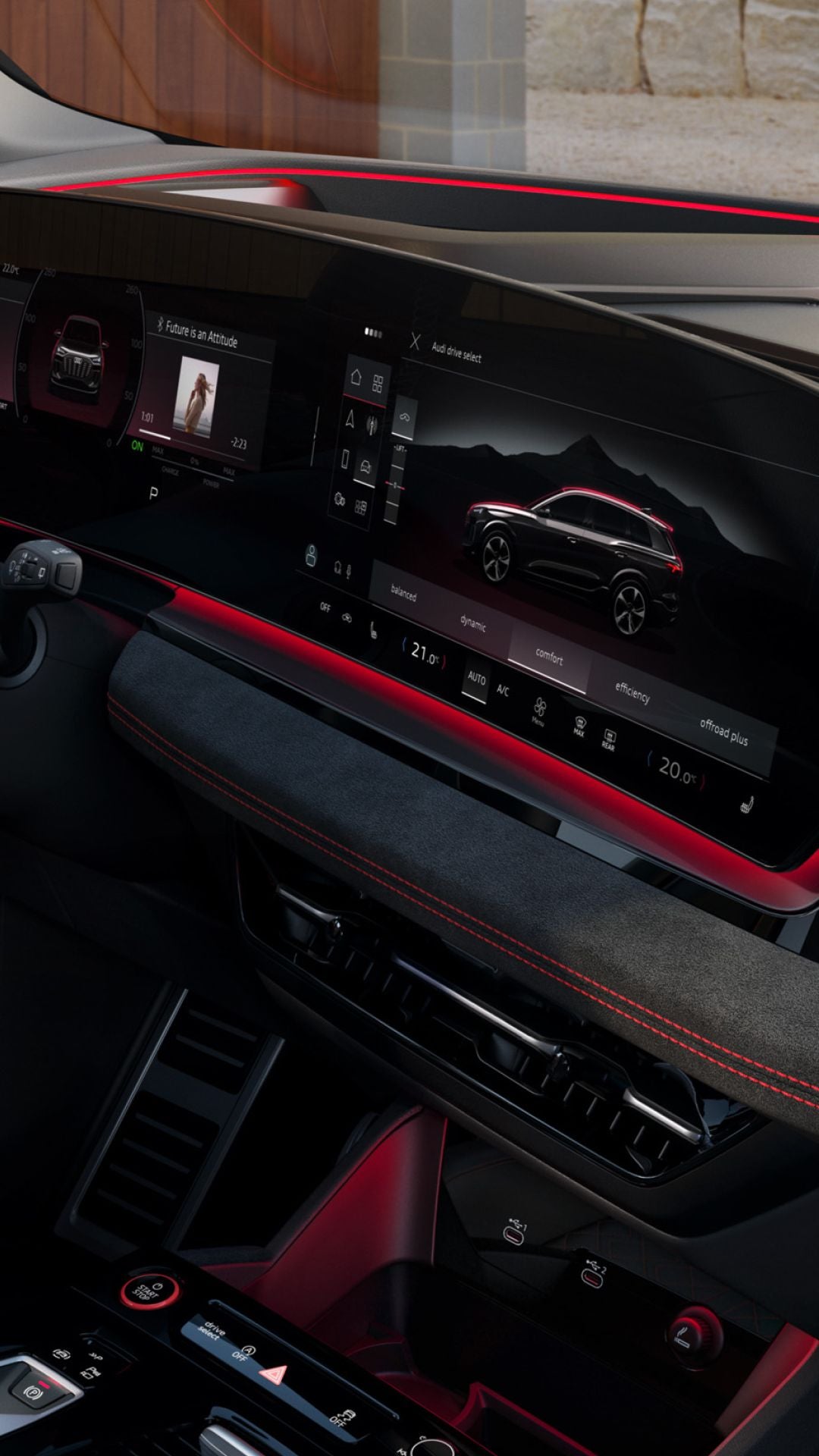 The interior of an Audi vehicle with the focus on the steering wheel and front dashboard