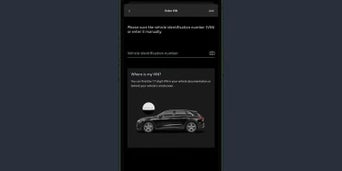 The myAudi app displaying the screen to add your VIN, either via a photo or text entry