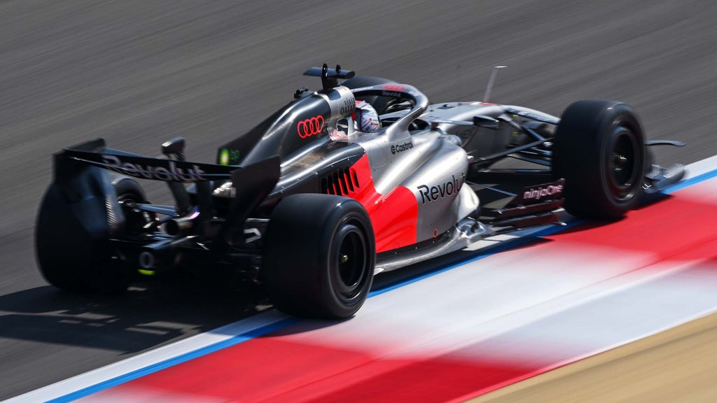 A picture showing the Audi R26 on the race track in Bahrain.