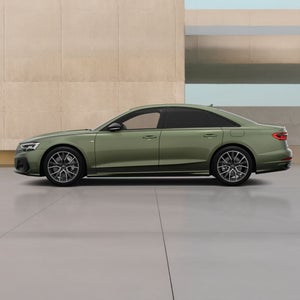 Left side of a green A8 TFSI e Audi vehicle