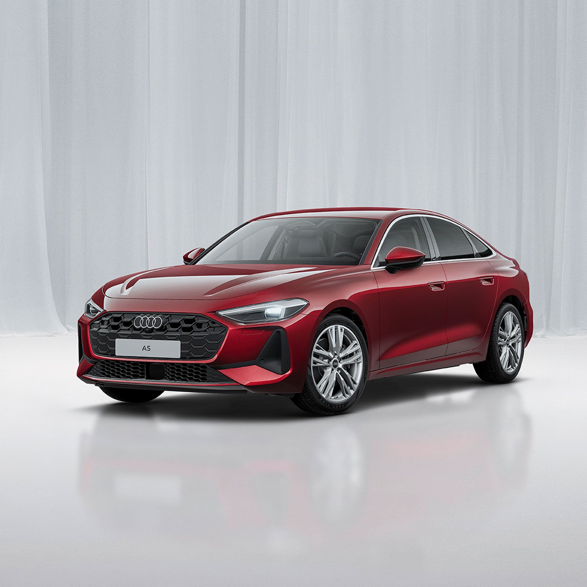 Audi A5 Limousine vor einem modernen Gebäude