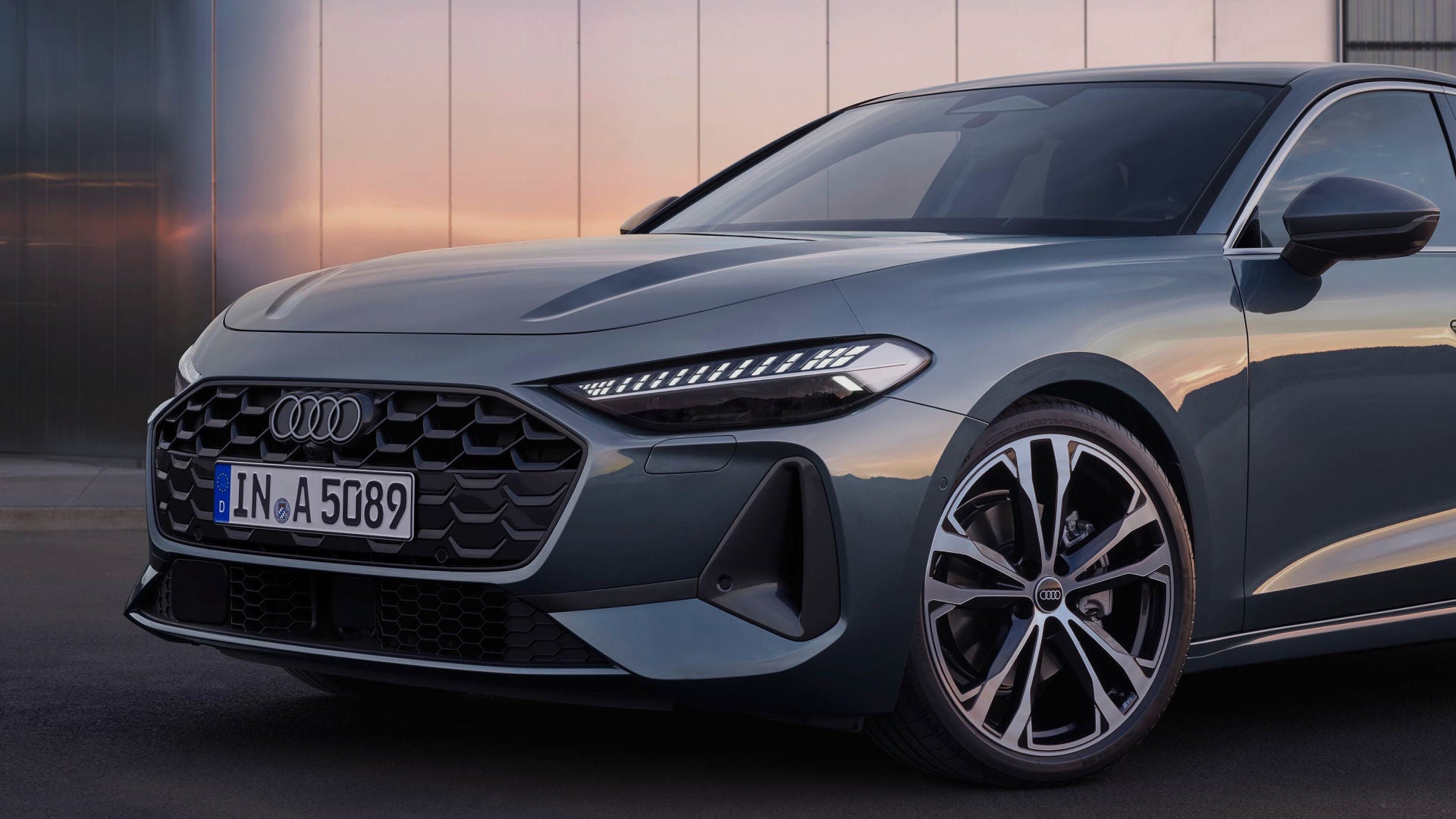 Front half of a dark coloured Audi