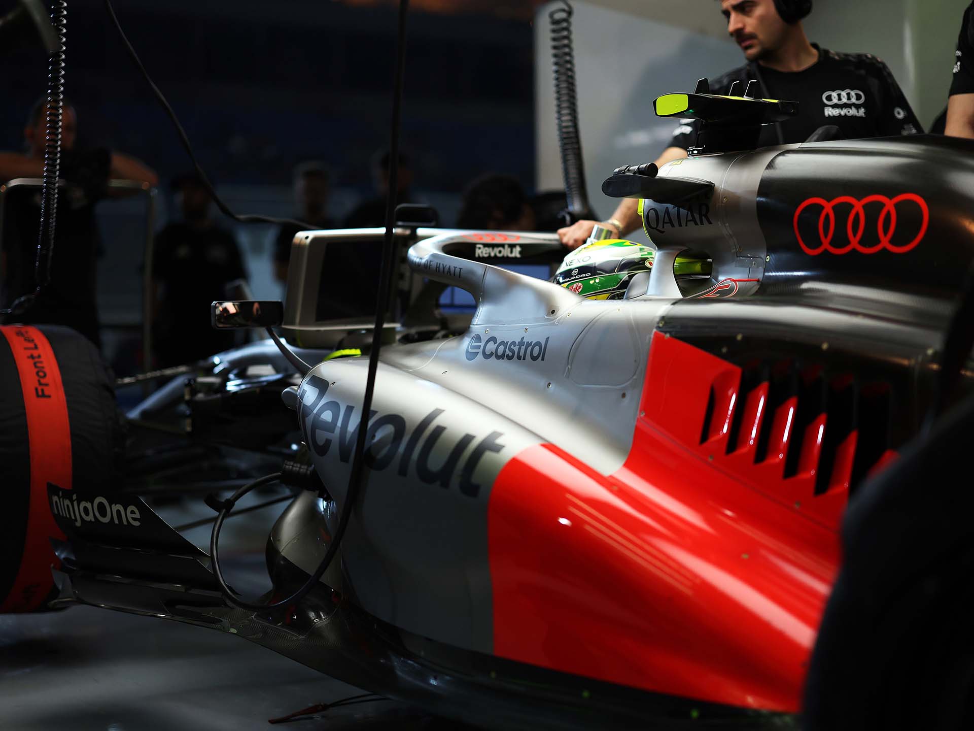 A picture showing the Audi R26 stationary in pitlane.