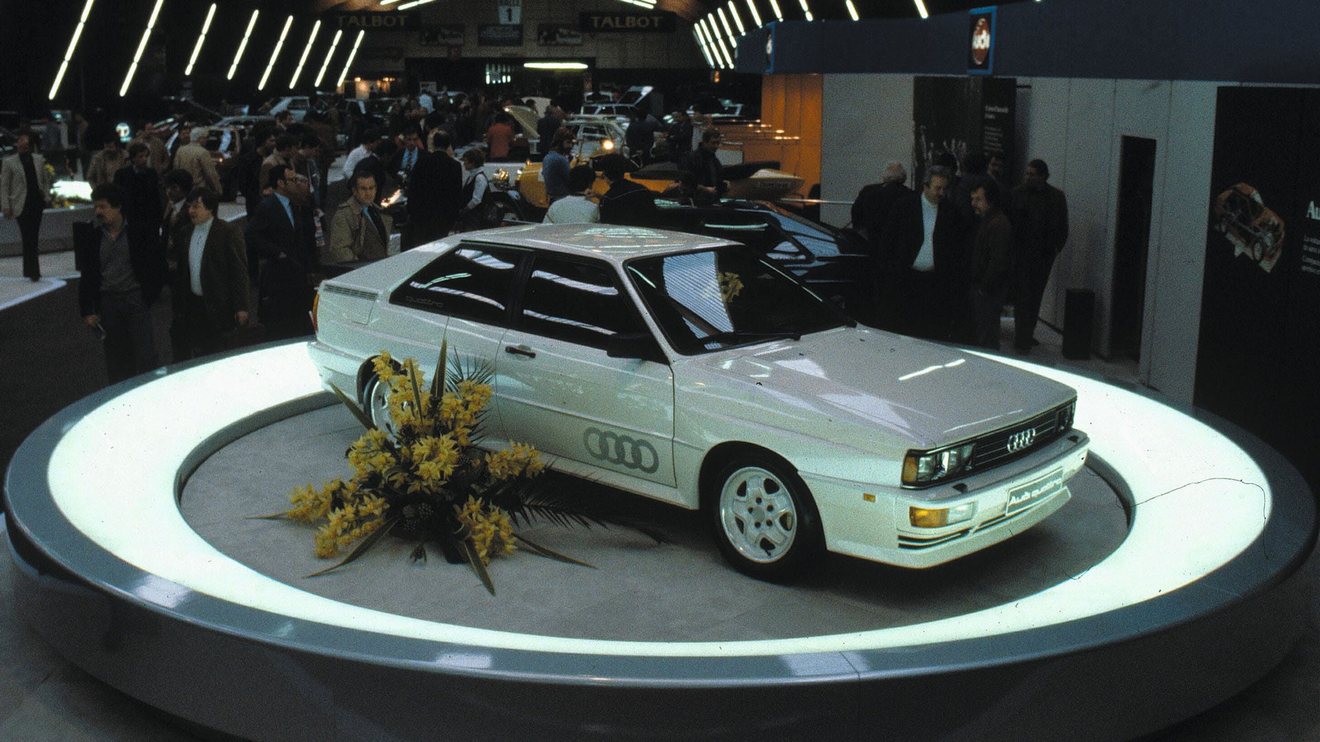 A picture showing an Audi quattro on display.