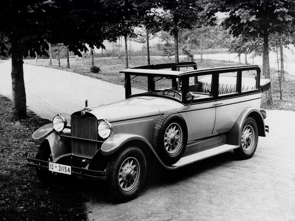 Black and white photo of the Audi Type R Imperator in front of trees