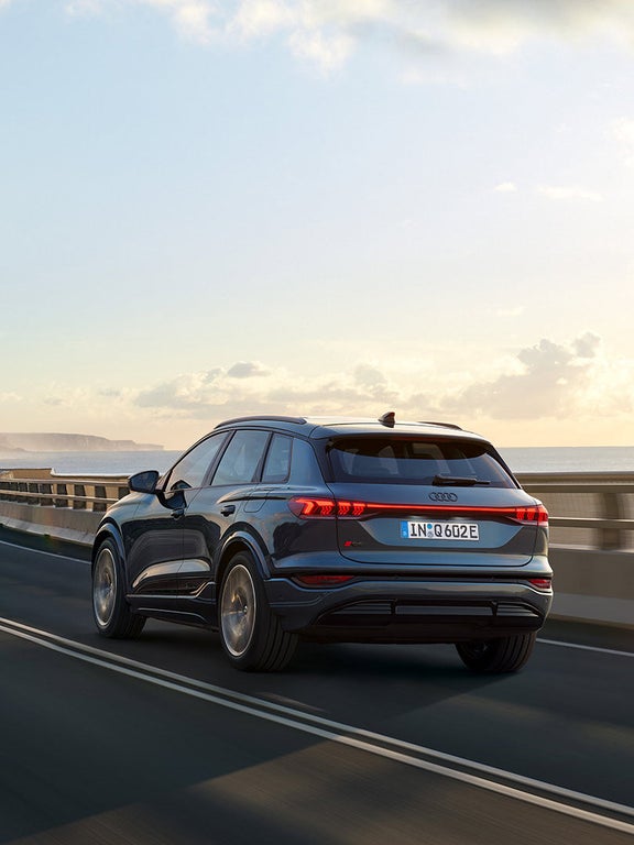 Dynamic rear view Audi Q6 SUV e-tron