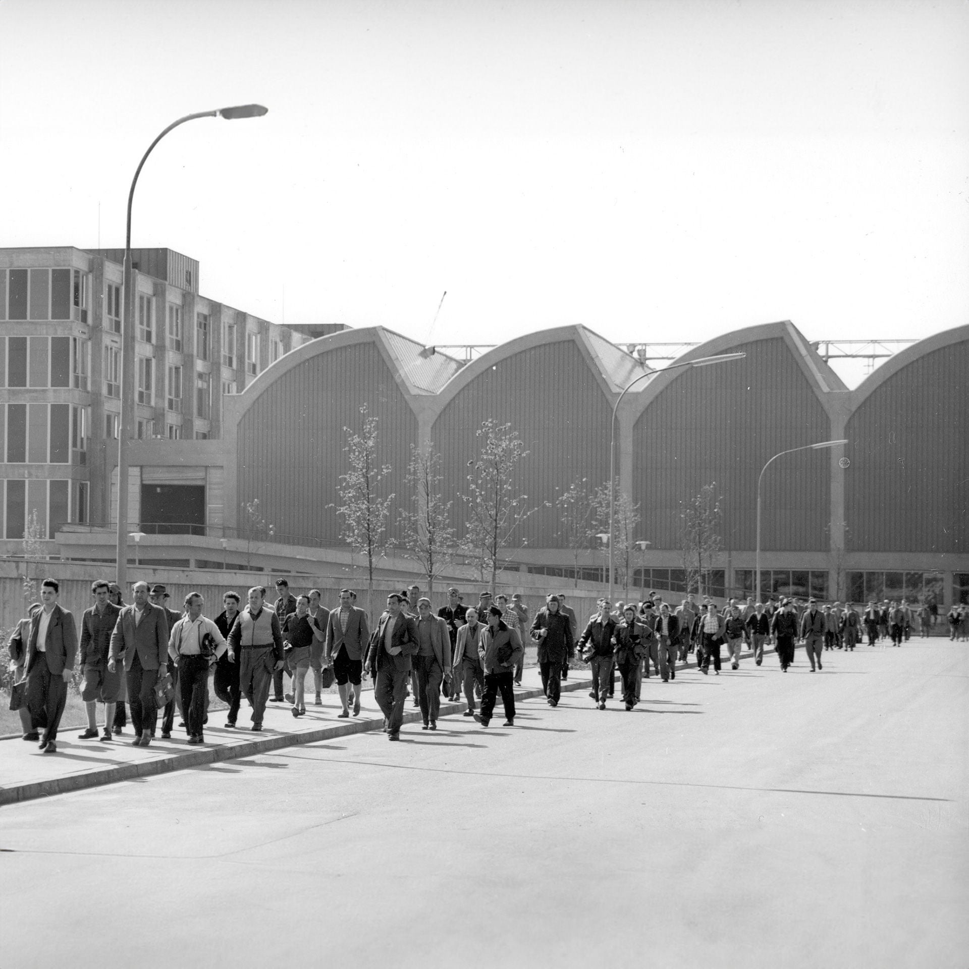 workers leaving the new factory in 1959