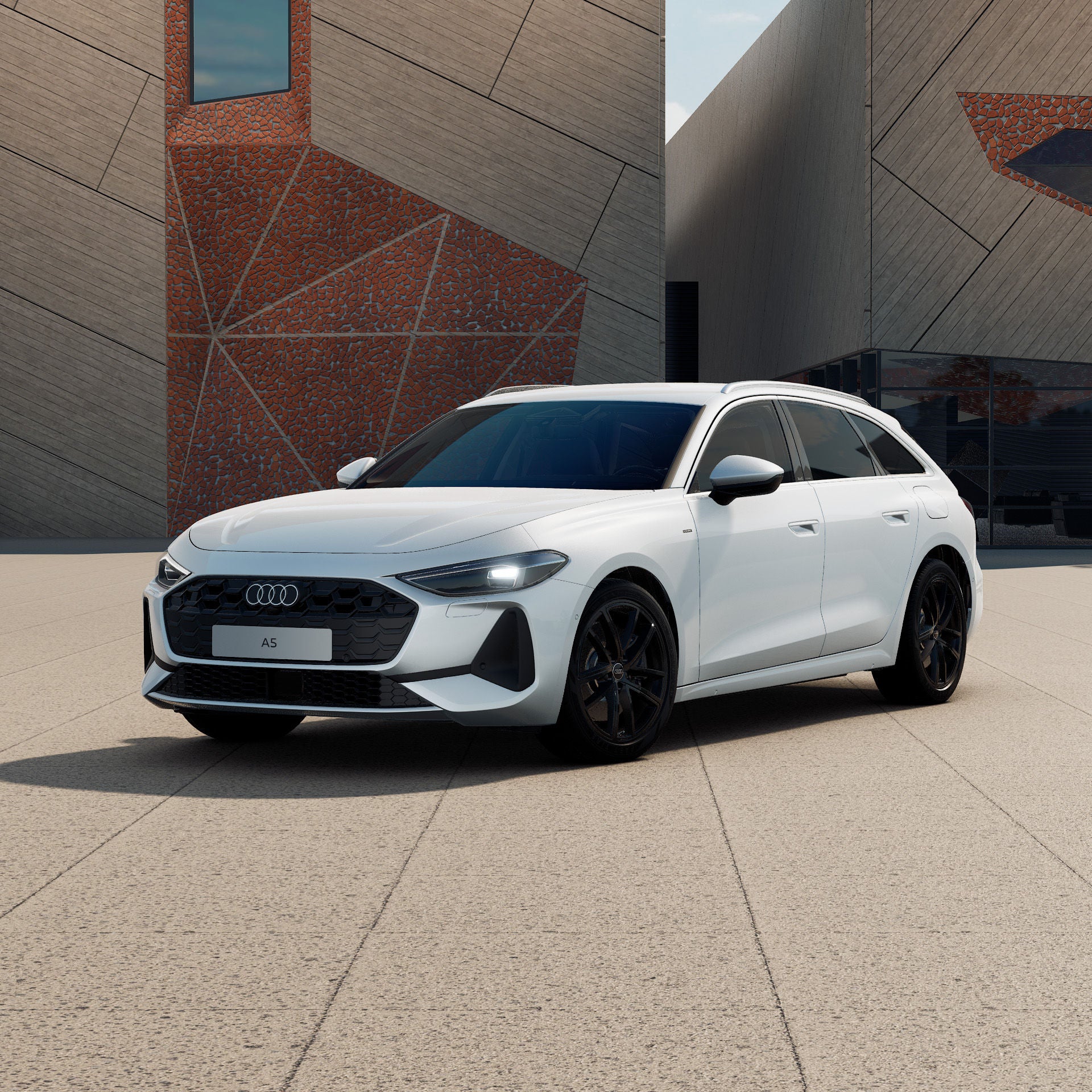 Ein Audi A5 Avant e-hybrid in Gletscherweiß Metallic schräg von vorne fotografiert vor einer futuristischen Kulisse