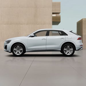 Left side of a white Q8 TFSI e Audi vehicle