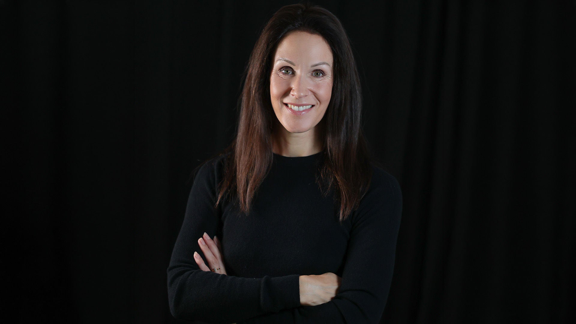 Manuela Schneider: Ansprechpartnerin der Audi Praxis Seminare (Porträtbild einer brünetten, lächelnden Frau).