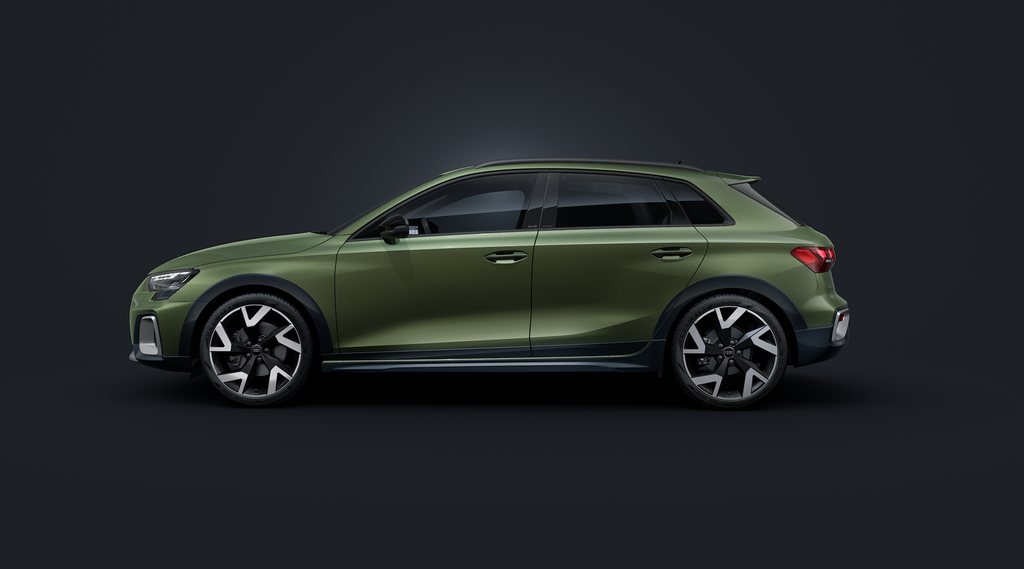 The Audi A3 allstreet, viewed from the side against a dark background.