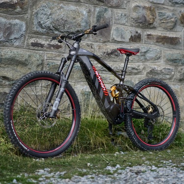 The drive unit of the Audi electric mountain bike sporting the e-tron logo