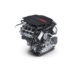 Der 3,0-Liter-V6-TFSI-Motor steht auf einem weißen Untergrund.