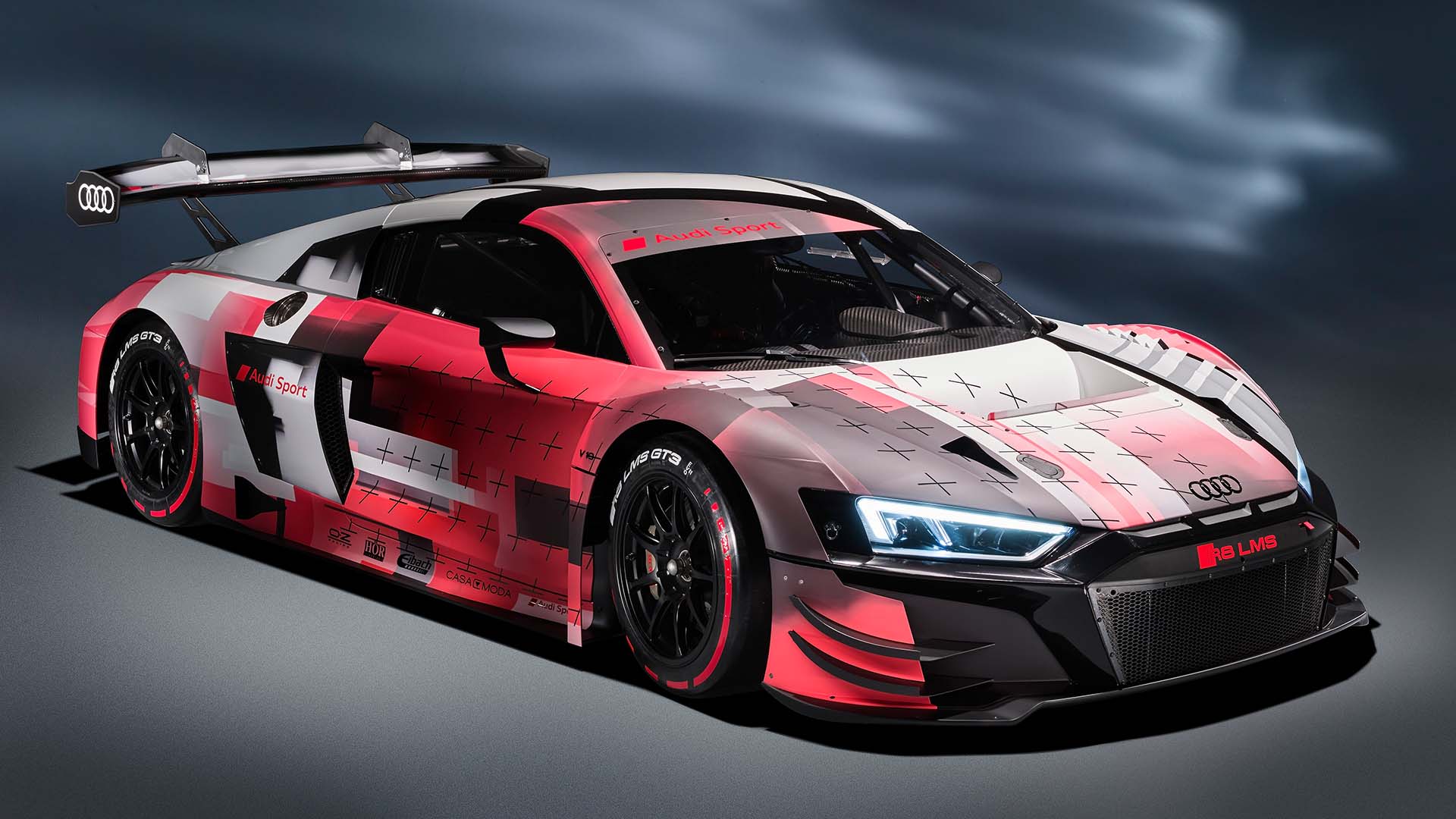 A picture showing the Audi R8 LMS GT3 race car on display.