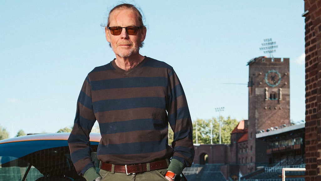 Porträtt av Jan Sandberg, stadion i Stockholm i bakgrunden