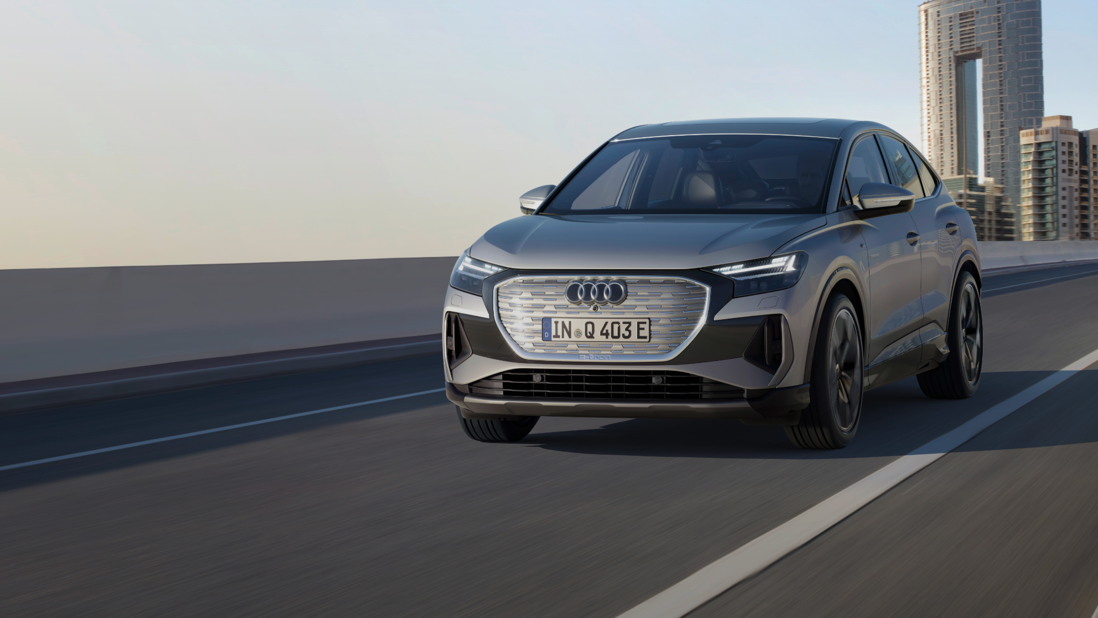 Image of silver Audi Q4 Sportback e-tron on a road